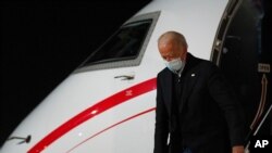 President-elect Joe Biden steps off a plane at New Castle Airport in New Castle, Del., Tuesday, Dec. 15, 2020. Biden is returning from a campaign rally in Atlanta for Georgia Democratic candidates for U.S. Senate Raphael Warnock and Jon Ossoff. (AP…