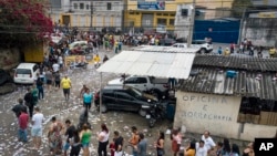 Elekte fe la ke pou vote nan katye ki rele Mare a nan Rio de Janeiro, Brezil, Dimanch, 2 Oct. 2022. 