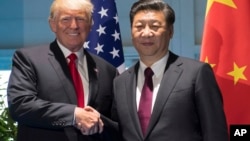 Tổng thống Trump và Chủ tịch Tập bên lề hội nghị thượng đỉnh G20 ở Đức hồi tháng Bảy. 