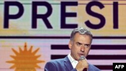 Uruguay's President-elect, Yamandu Orsi, of the Frente Amplio coalition, delivers his victory speech after the presidential runoff election in Montevideo on November 24, 2024.