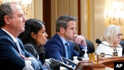 From left, Rep. Adam Schiff, D-Calif., Soumya Dayananda, committee investigative staff counsel, Rep. Adam Kinzinger, R-Ill., and Vice Chair Liz Cheney, R-Wyo., listen to proceedings of the House select committee's investigation of the Jan. 6 attack on the