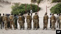 Hassan Hanafi Haji, giữa, một cựu nhà báo Somalia có liên hệ với al-Shabaab bị xử tử ở thủ đô Mogadishu hôm 11/4/2016.