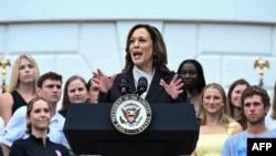 US Vice President Kamala Harris speaks during an event honoring National Collegiate Athletic Association (NCAA) championship teams from the 2023-2024 season, on the South Lawn of the White House in Washington, DC on July 22, 2024.