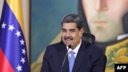 Handout photo released by Miraflores presidential palace press office shows Venezuela's President Nicolas Maduro da cabinet meeting with the National Defense Council and the Council of State at the Foreign Ministry building in Caracas, Venezuela on August