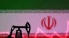 FILE PHOTO: Illustration shows Iran flag, oil pump jack and stock graph