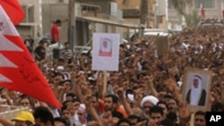 Thousands chant anti-government slogaAs as they march during a funeral procession for Sayed Hameed Mahfoodh, 61, in the western Shiite Muslim village of Saar, Bahrain, Wednesday, April 6, 2011. Relatives said Mahfoodh went missing Tuesday evening and alle