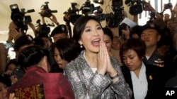 Cựu Thủ tướng Thái Lan Yingluck Shinawatra rời khỏi Trụ sở Quốc hội ở Bangkok, Thái Lan, ngày 22/1/2015.