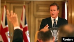 Thủ tướng Anh David Cameron trả lời họp báo ở Downing Street, trung tâm London, 29/8/2014.