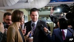 House Intelligence Committee Chairman Rep. Devin Nunes, R-Calif. is pursued by reporters as he arrives for a weekly meeting of the Republican Conference with House Speaker Paul Ryan and the GOP leadership, March 28, 2017, on Capitol Hill in Washington.