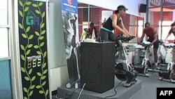 Health club members can see how much electricity they generate while riding their exercise bikes.