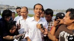 Kết quả chính thức của cuộc bầu cử Tổng thống Indonesia cho thấy cựu Đô trưởng Jakarta Joko Widodo (trong hình) đã đánh bại cựu Trung tướng Prabowo Subianto.