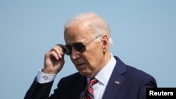 U.S. President Joe Biden arrives at Boston Logan International Airport