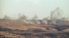 A picture taken from the southern Lebanese area of Marjayoun on July 3, 2024, shows smoke billowing over hills in the Israeli-annexed Golan Heights after rockets were fired from the Lebanese side of the border.