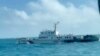 In this screen grab from video released by the Taiwan Coast Guard, a view of a China Coast Guard boat from a Taiwan Coast Guard boat as it passes near the coast of Matsu islands, Taiwan on Oct. 14, 2024. 