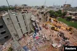 Hiện trường vụ sập tòa nhà Rana Plaza 8 tầng ở Bangladesh gây thiệt mạng cho hơn 1.100 công nhân xưởng dệt may ngày 30/4/2013.