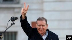 FILE - Venezuelan opposition leader Edmundo Gonzalez waves to supporters at Puerta del Sol in Madrid, Spain, Sept. 28, 2024.