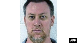 This image provided by the Missouri Department of Corrections shows Christopher Collings, 49, who was convicted of raping and strangling a 9-year-old girl in 2007.