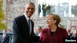 Tổng thống Mỹ Barack Obama và Thủ tướng Đức Angela Merkel.