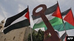 Những người Palestine tham gia cuộc biểu tình đánh dấu năm thứ 63 ngày họ gọi là 'Ðại họa' ở quảng trường Máng Cỏ trong thành phố Bethlehem ở vùng bờ Tây