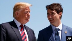 Tổng thống Trump và Thủ tướng Trudeau tại hội nghị thượng đỉnh G7 ở Canada