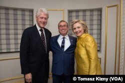 Murat Güzel Clinton çiftiyle