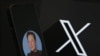 This illustration photograph shows the logo of social network X (formerly Twitter) and a photograph of CEO of social network X, Elon Musk displayed on a smartphone in Brussels on September 27, 2024. (Photo by Nicolas TUCAT / AFP)