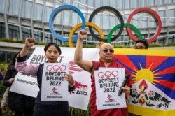 Tibetli insan hakları savunucuları Kış Olimpiyatları'nın Pekin'de yapılacak olmasını protesto ediyorlar.