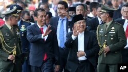 Tân Tổng thống Indonesia Joko Widodo và Phó Tổng thống Jusuf Kalla tại Jakarta, Indonesia, ngày 20/10/2014.