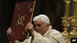 Pope Benedict celebrates the Christmas Eve Mass in St. Peter's Basilica at the Vatican Dec. 24, 2012