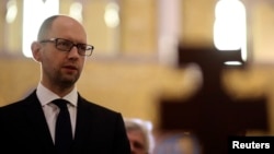 Ukrainian Prime Minister Arseniy Yatsenyuk visits the Santa Sophia Church in Rome, Apr. 26, 2014. 