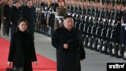 Foto Achiv: Lide Kore di No, Kim Jong Un ak Madanm ni. 