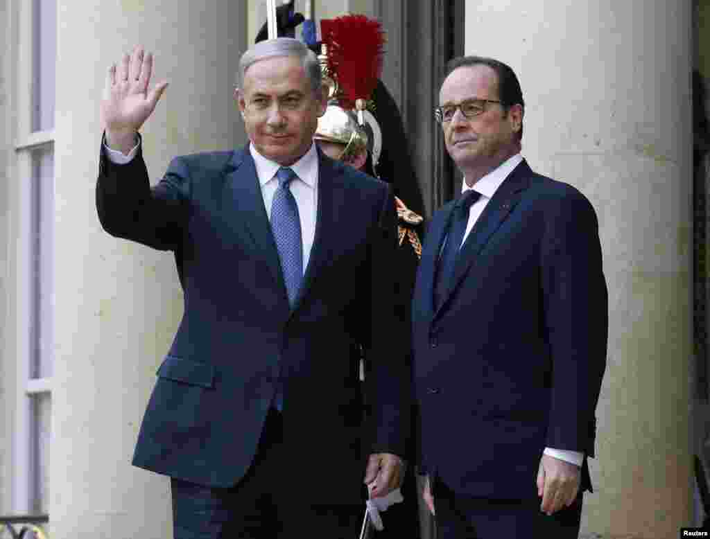 Tổng thống Pháp Francois Hollande đón Thủ tướng Israel Benjamin Netanyahu tại Điện Elysee trước khi tham dự cuộc diễu hành đoàn kết trên các đường phố của Paris, ngày 11/1/2015.