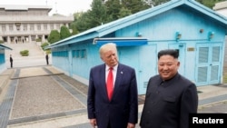 Tư liệu: TT Trump gặp lãnh tụ Triều Tiên Kim Jong Un tại vùng phi quân sự phân cách hai miền bán đảo Triều Tiên, tại Bàn Môn Điếm, ngày 30/6/2019.