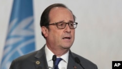 Tổng thống Pháp François Hollande phát biểu trong phiên khai mạc hội nghị khí hậu của Liên Hiệp Quốc ở Morocco, ngày 15 tháng 11 năm 2016.