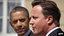 Tổng thống Hoa Kỳ Barack Obama và Thủ tướng Anh David Cameron trong 1 cuộc họp báo ở London, 25/5/2011