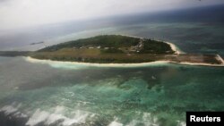 An aerial view shows the Pagasa (Hope) Island, which belongs to the disputed Spratly group of islands, in the South China Sea located off the coast of western Philippines July 20, 2011. Five Philippine politicians are planning a trip to disputed territori