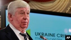 Tổng Công tố viên Ukraine Viktor Shokin phát biểu trong cuộc họp báo ở Kiev, Ukraine, ngày 16 tháng 2 năm 2015.