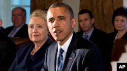 Tổng thống Hoa Kỳ Barack Obama và cựu Bộ trưởng Ngoại giao Hillary Clinton