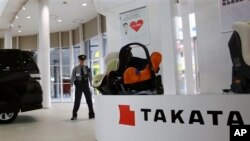 Một buổi triển lãm xe hơi của Công ty Takata Corp ở Tokyo. 