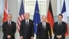 (L-R) British Prime Minister Keir Starmer, US President Joe Biden, German Chancellor Olaf Scholz and French President Emmanuel Macron pose for a family photo at the start of their "Quad meeting" at the Chancellery in Berlin, on October 18, 2024.