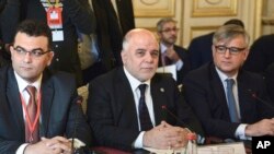 Thủ tướng Iraq al-Haydar Abadi, và liên minh chống IS trong cuộc họp tại Paris, ngày 2/6/2015.