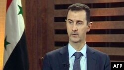 Tổng thống Syria Bashar al-Assad phát biểu trong một cuộc phỏng vấn tại Damascus, ngày 29/8/2012